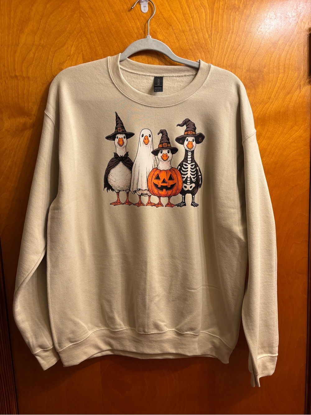 Gildan Cream Crewneck Sweatshirt with Halloween Duck Graphic
